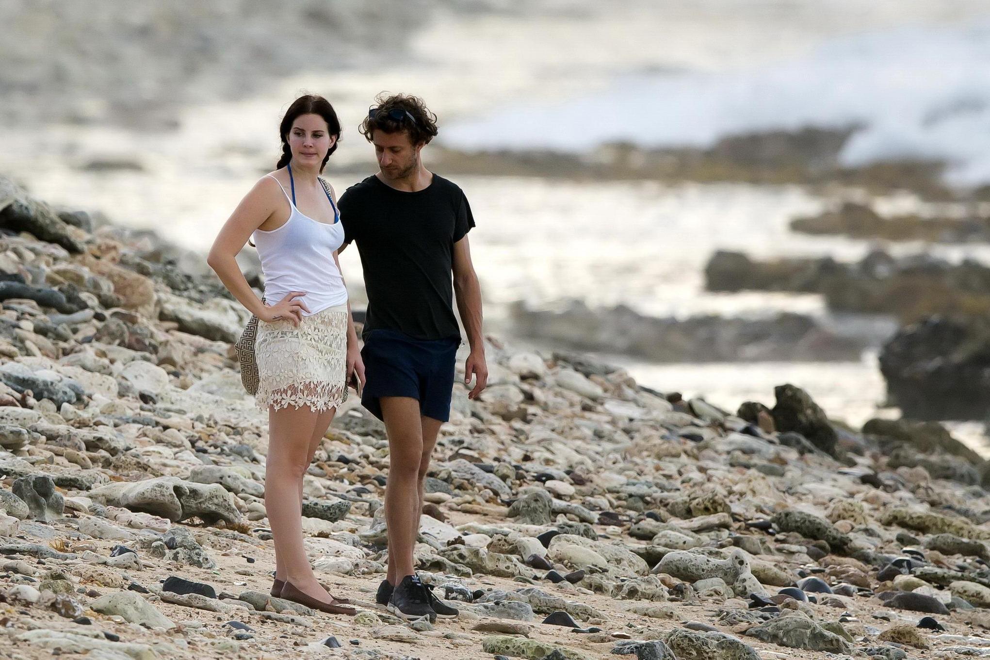 16P Lana Del Rey wearing blue bikini under the cthru skirt  top on a beach in St Bar