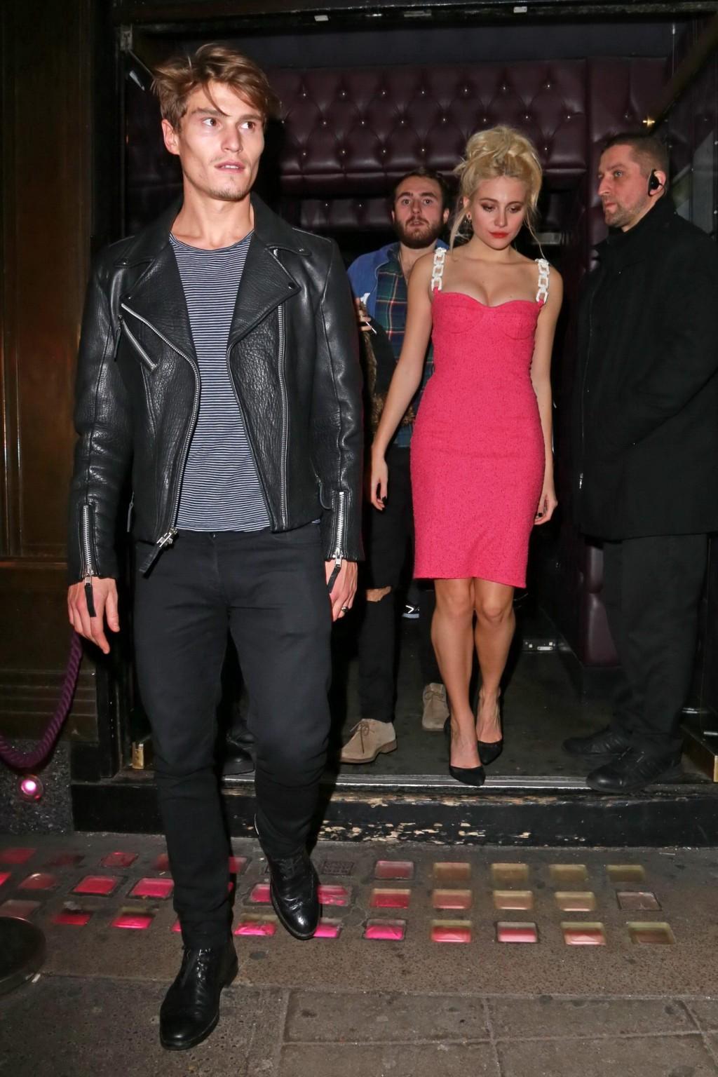 16P Pixie Lott shows huge cleavage leaving the Freedom Bar in Soho London