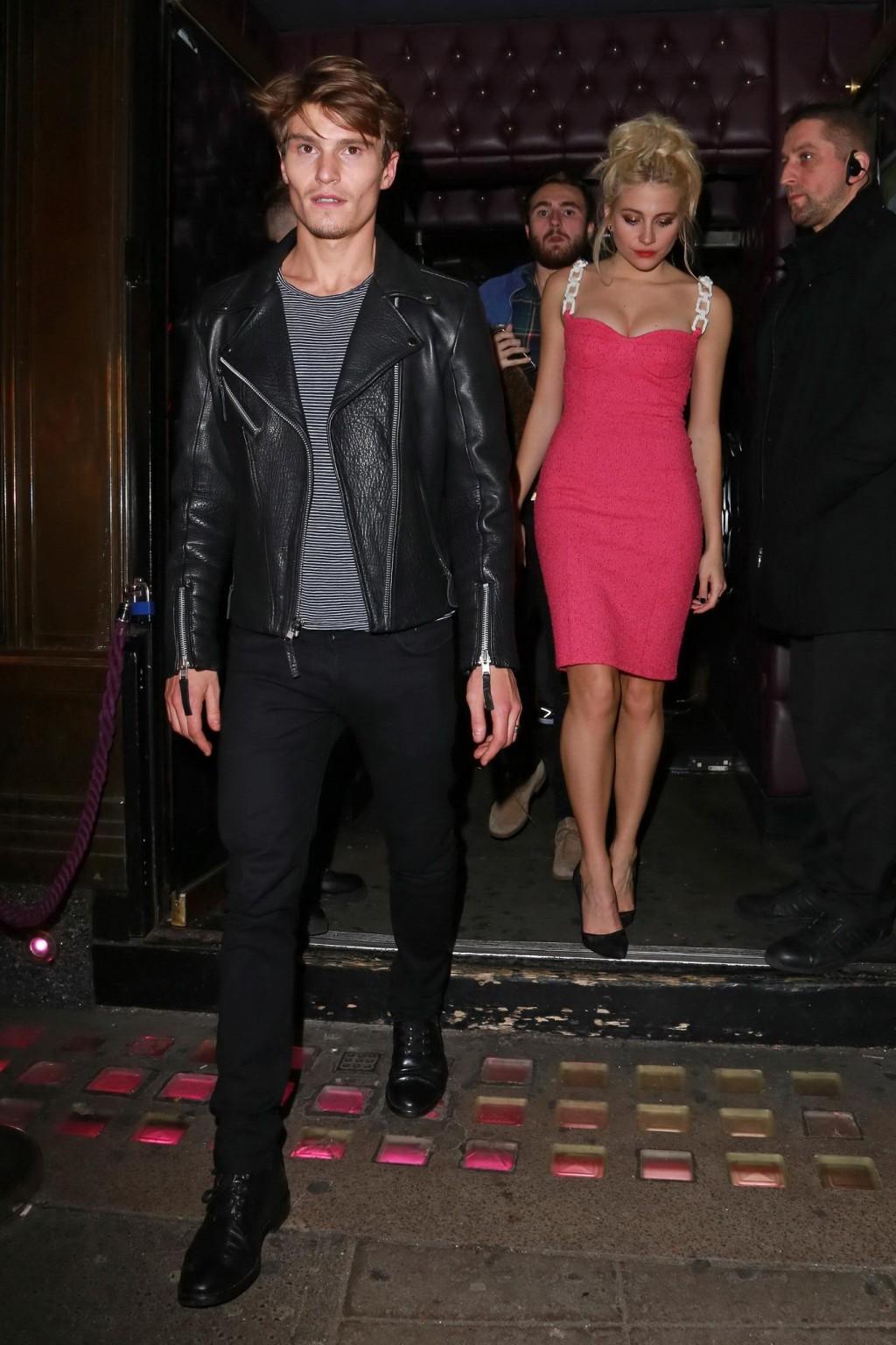 16P Pixie Lott shows huge cleavage leaving the Freedom Bar in Soho London