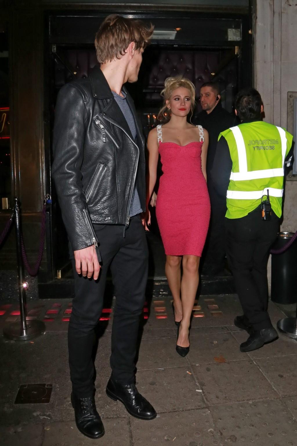 16P Pixie Lott shows huge cleavage leaving the Freedom Bar in Soho London