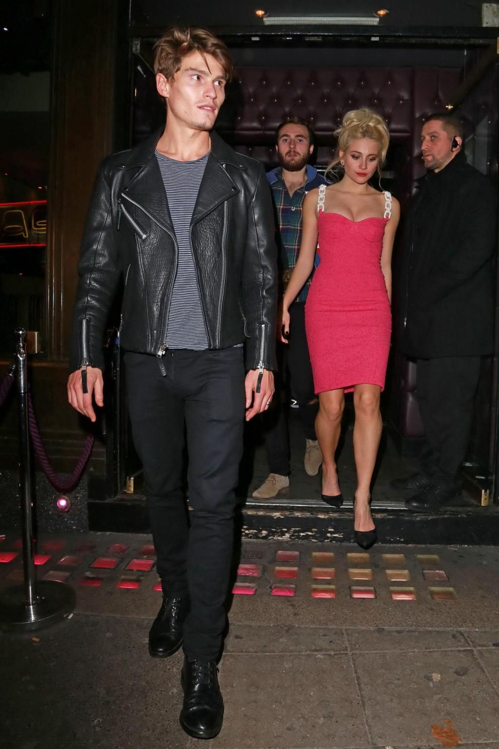 16P Pixie Lott shows huge cleavage leaving the Freedom Bar in Soho London