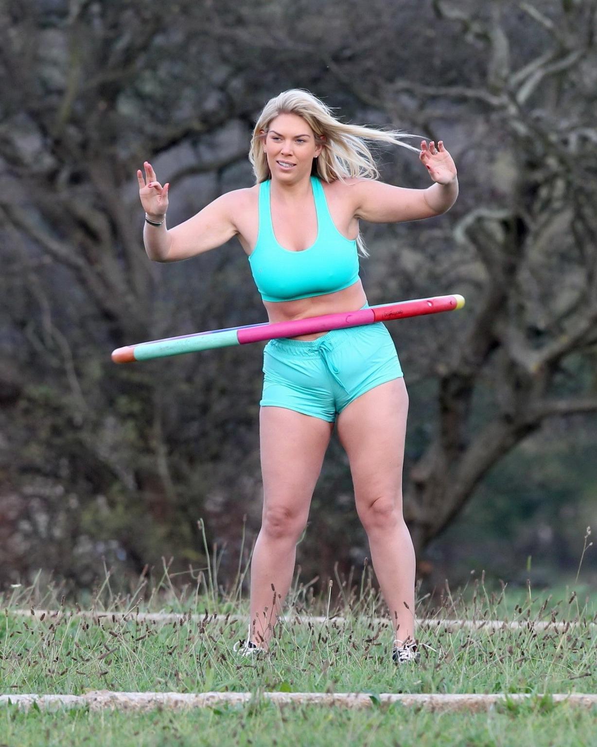 16P Frankie Essex shows off her huge boobs and cameltoe in blue sports bra and short