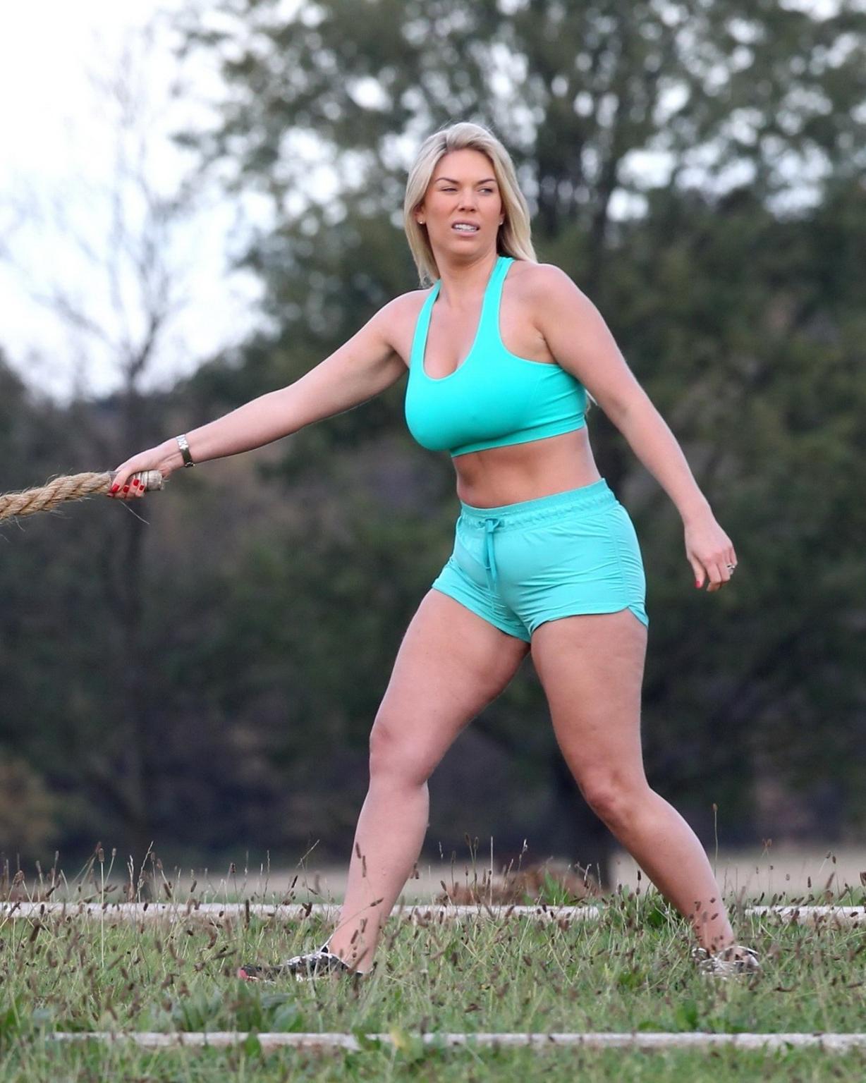 16P Frankie Essex shows off her huge boobs and cameltoe in blue sports bra and short