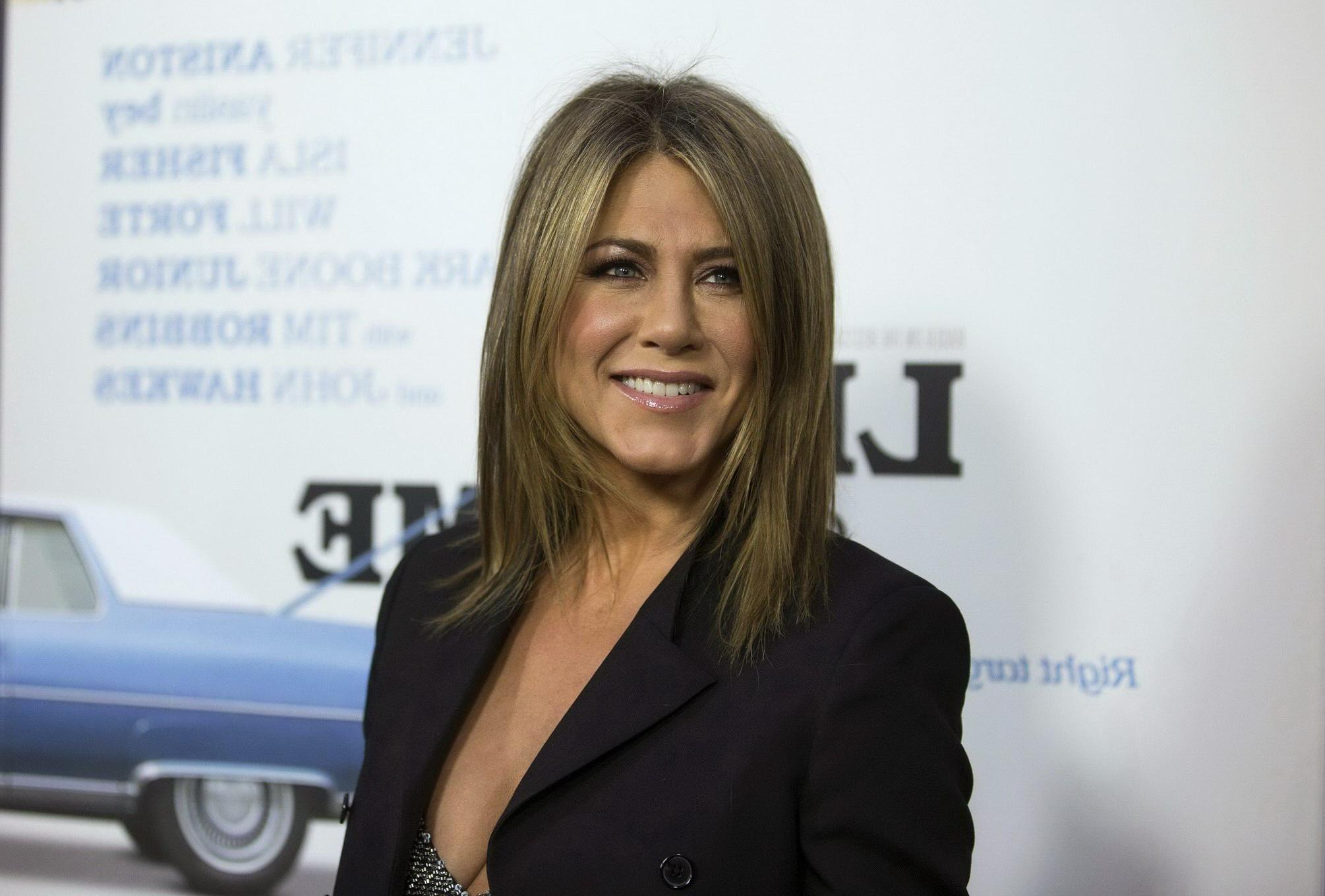 16P Jennifer Aniston pregnant and cleavy at the Life of Crime Premiere At ArcLight C