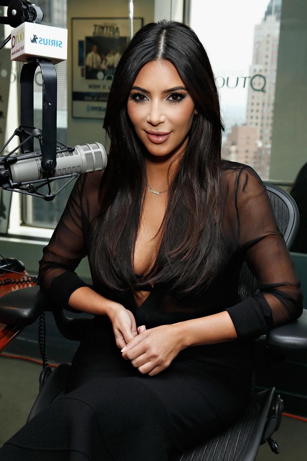 16P Kim Kardashian see through to bra at the SiriusXM Studios in NYC