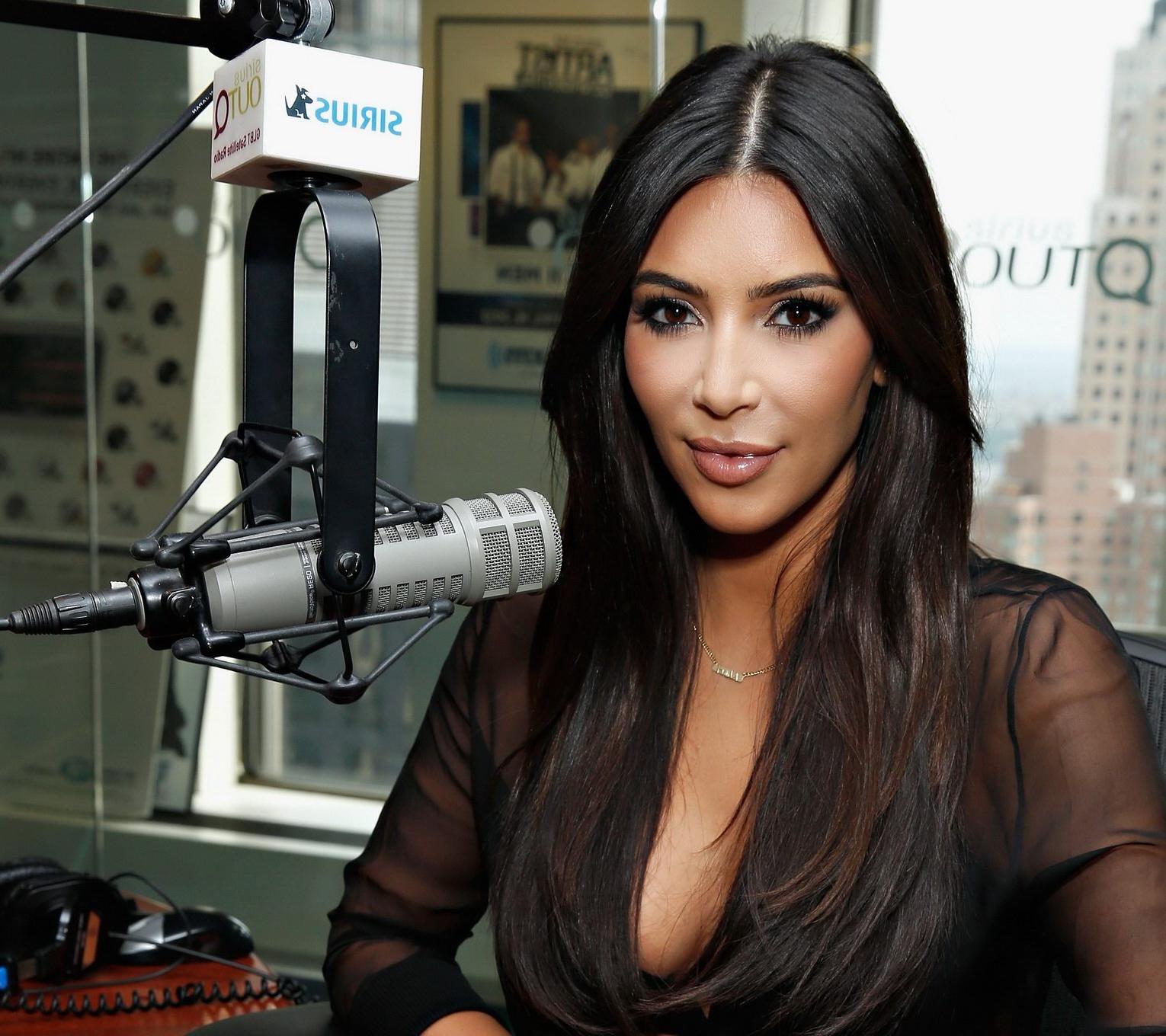 16P Kim Kardashian see through to bra at the SiriusXM Studios in NYC