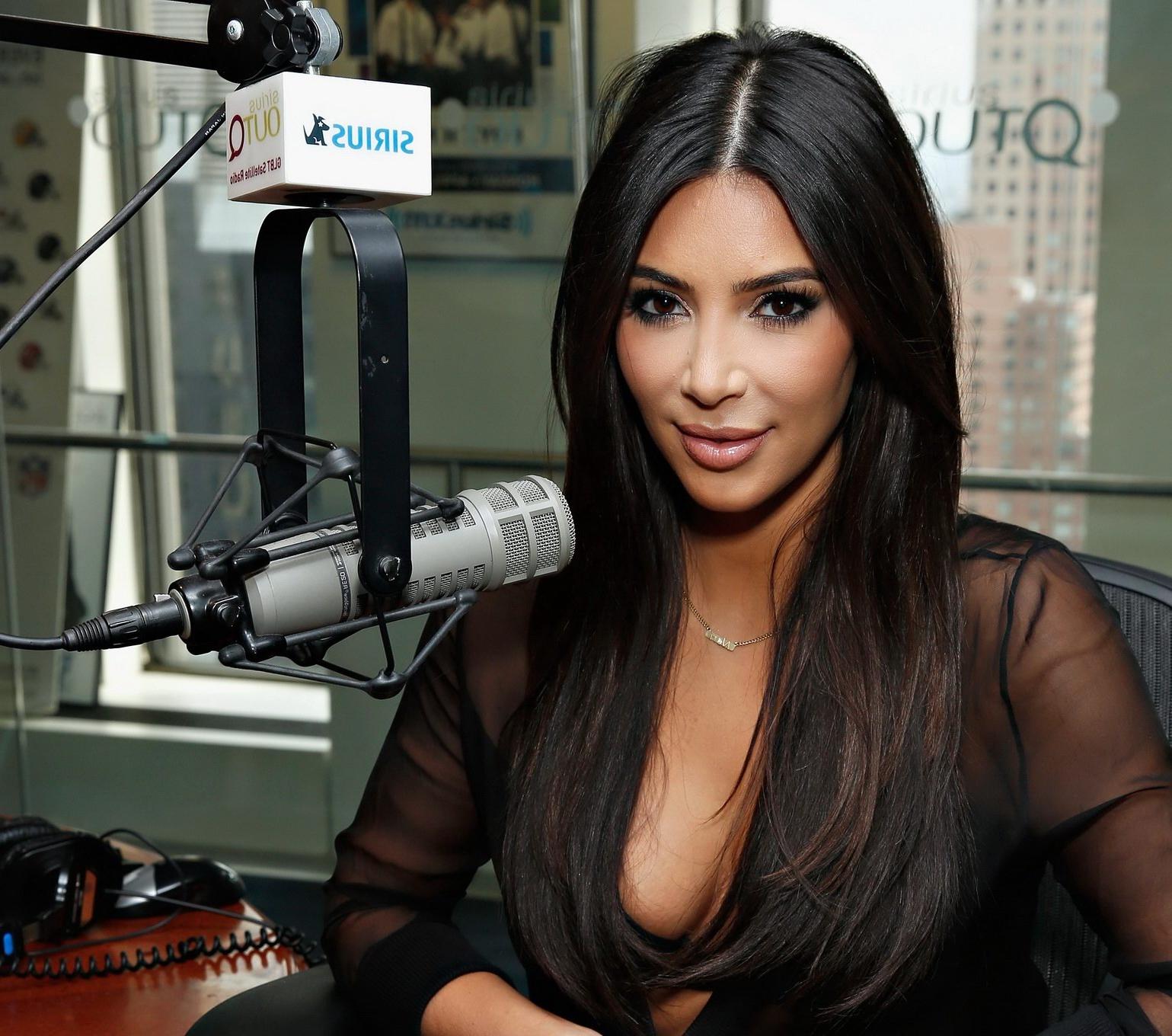 16P Kim Kardashian see through to bra at the SiriusXM Studios in NYC