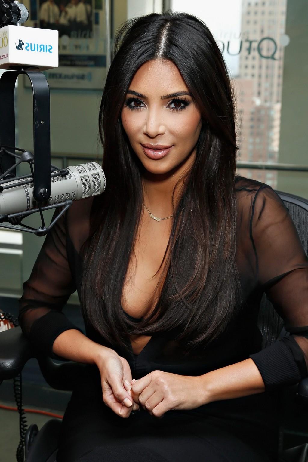16P Kim Kardashian see through to bra at the SiriusXM Studios in NYC