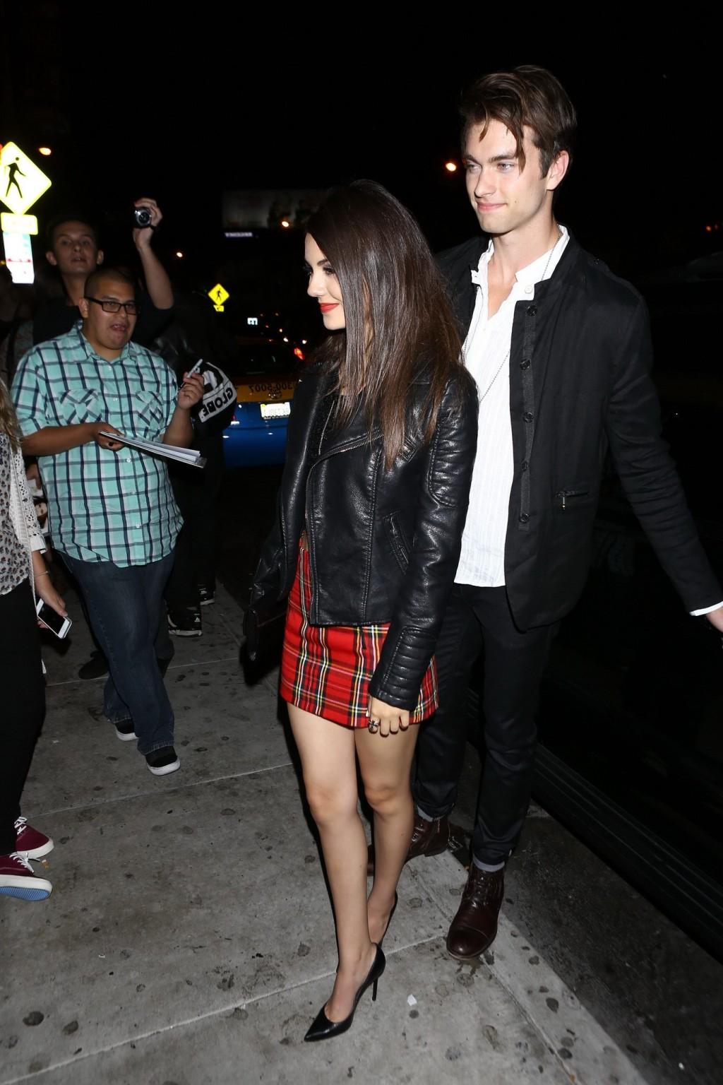 16P Victoria Justice leggy in plaid mini skirt leaving the Roxy Theatre in West Holl