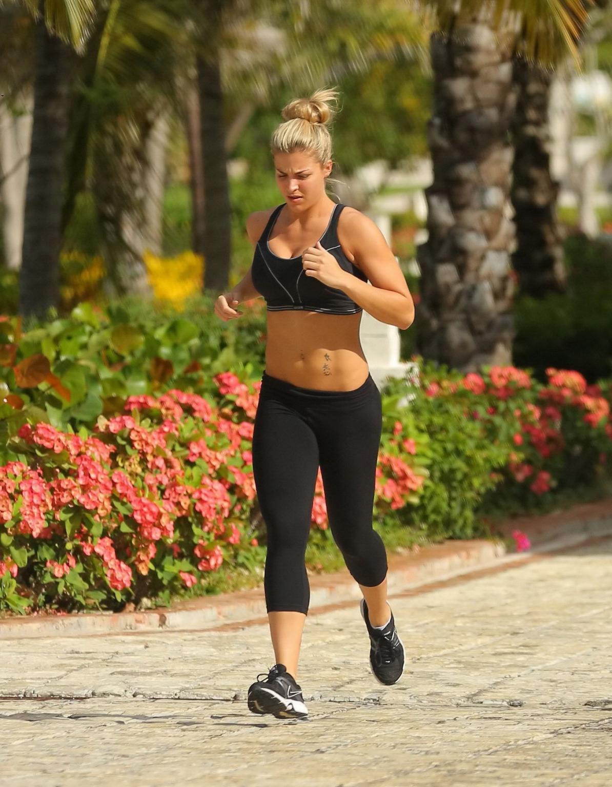 16P Gemma Atkinson busty and booty in black sports bra and tights during morning jog