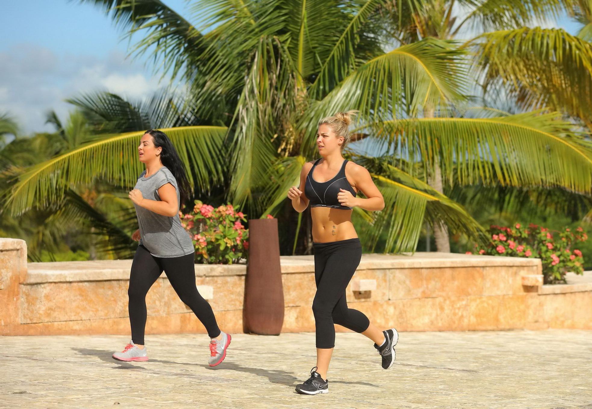 16P Gemma Atkinson busty and booty in black sports bra and tights during morning jog