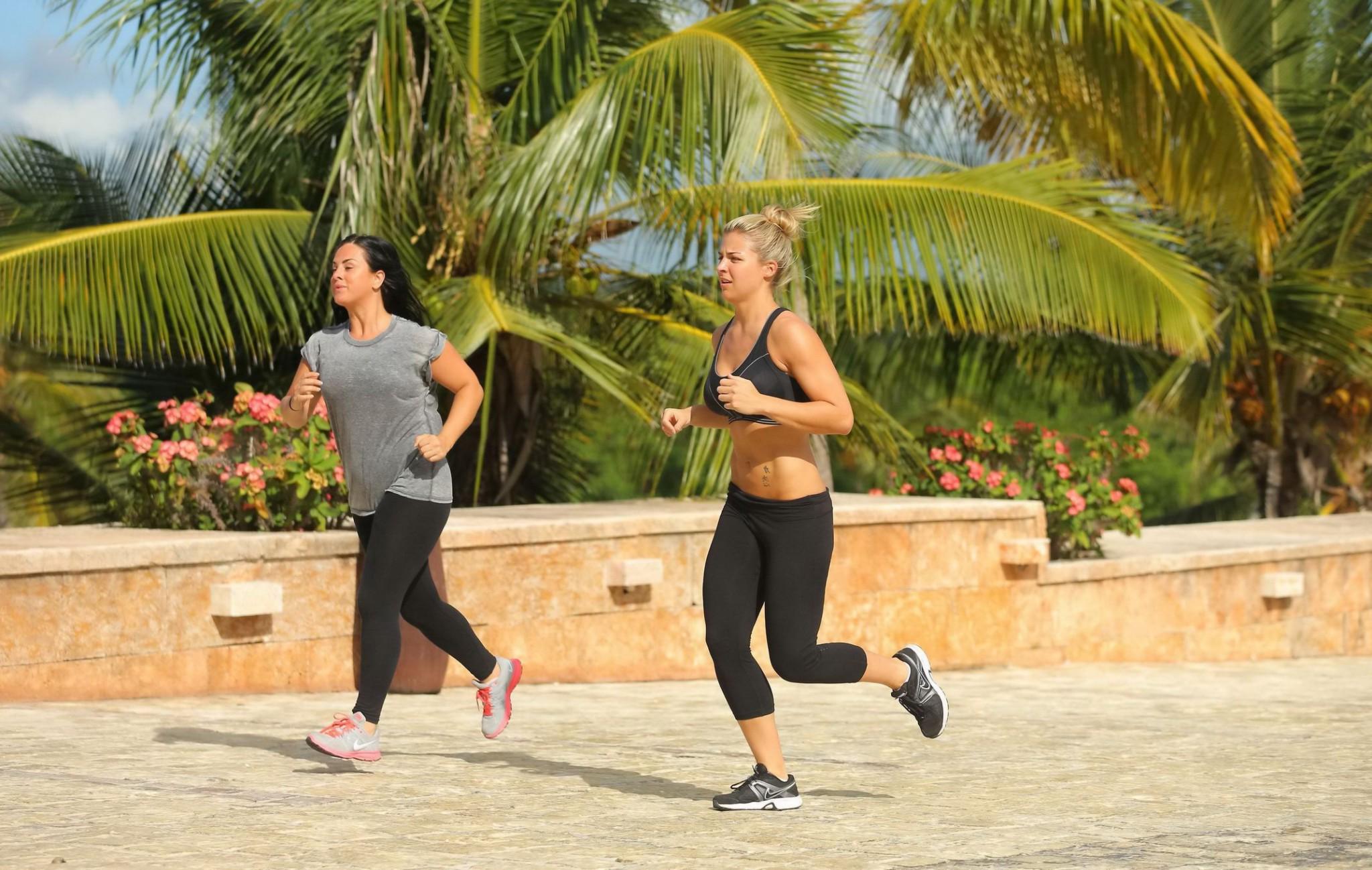 16P Gemma Atkinson busty and booty in black sports bra and tights during morning jog