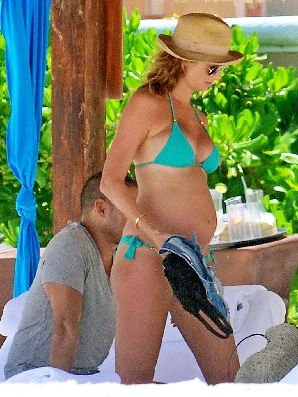16P Stacy Keibler pregnant wearing a turquoise bikini in Mexico