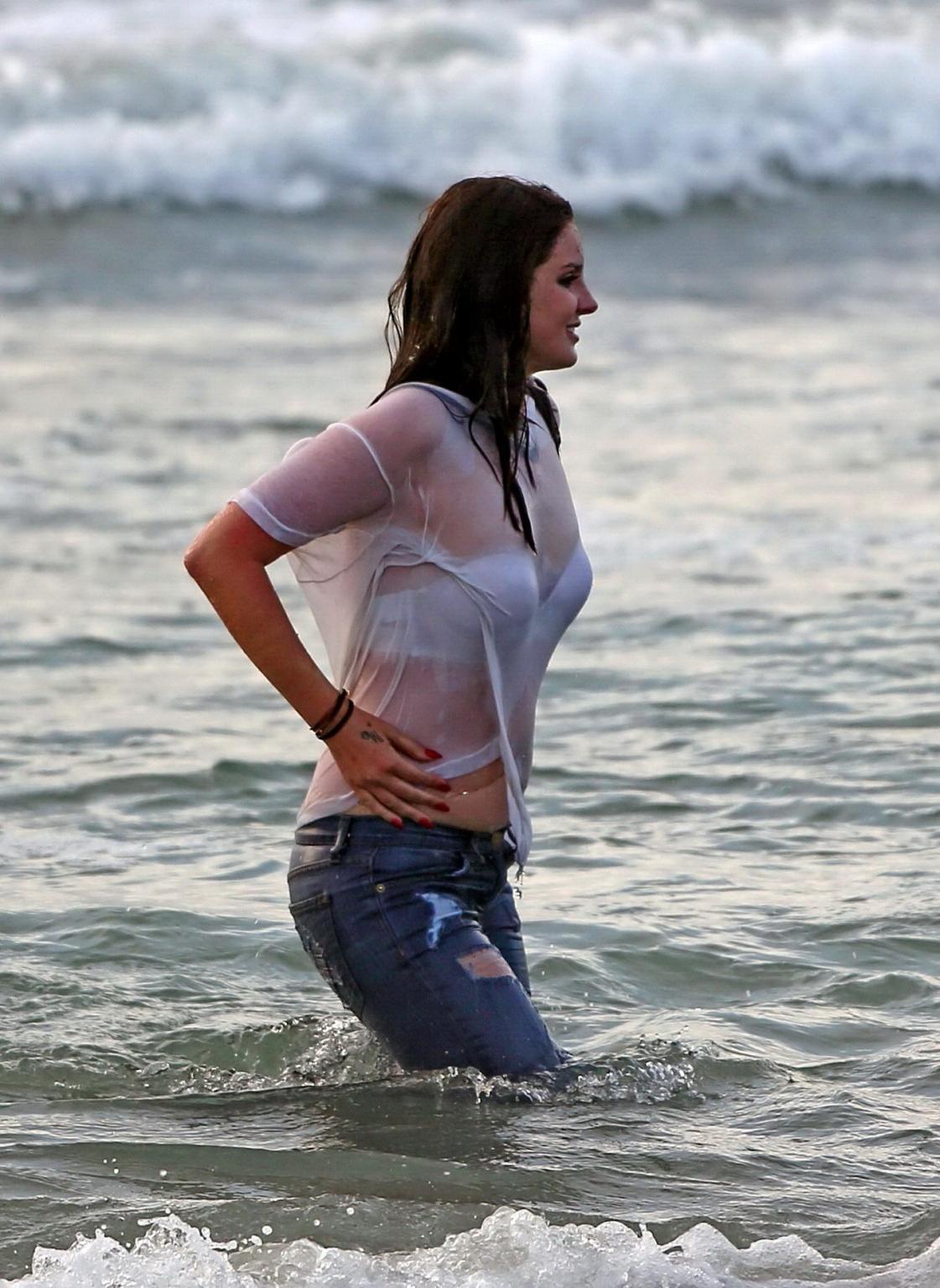 16P Lana Del Rey in white bra and wet Tshirt shooting a music video in Marina Del Re