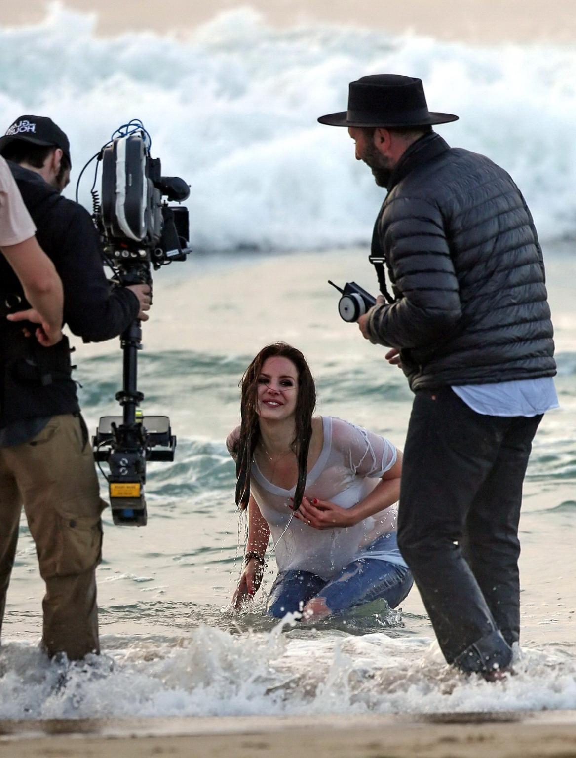 16P Lana Del Rey in white bra and wet Tshirt shooting a music video in Marina Del Re