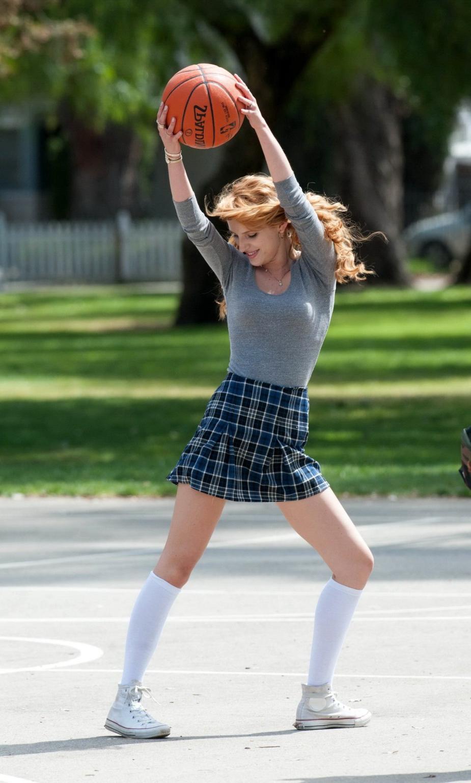 16P Bella Thorne playing basketball in a schoolgirl outfit on the set of Mostly Ghos