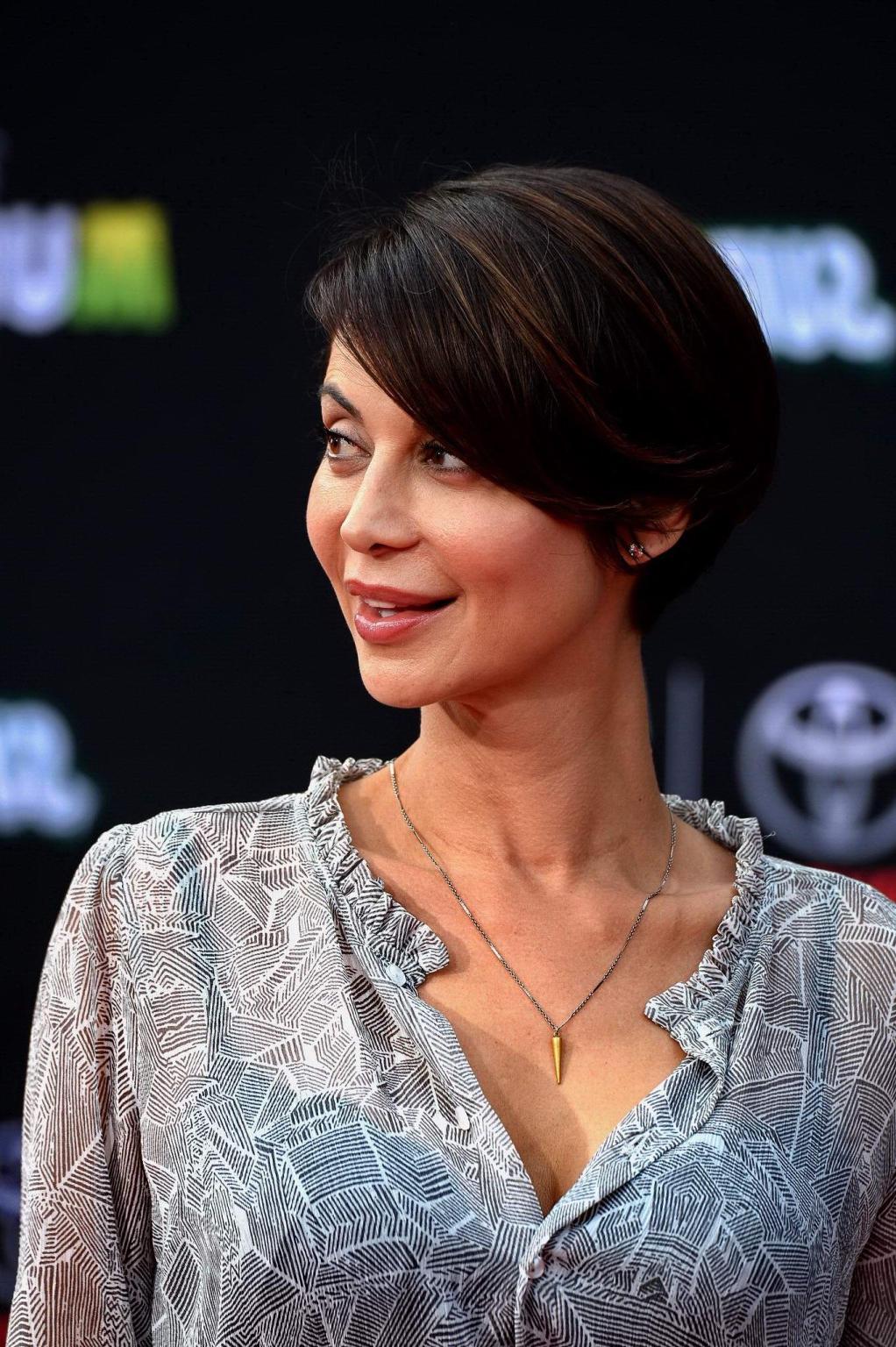 16P Catherine Bell see through to bra at the premiere in Hollywood