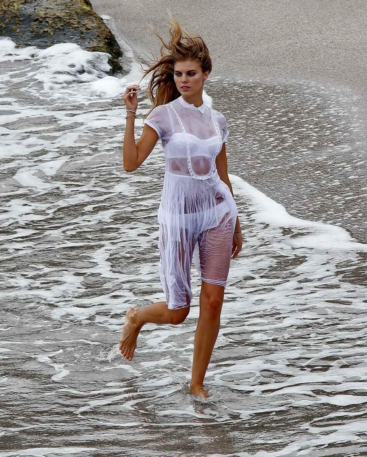 16P Maryna Linchuk getting her boobs groped while changing on the set of a Vogue pho