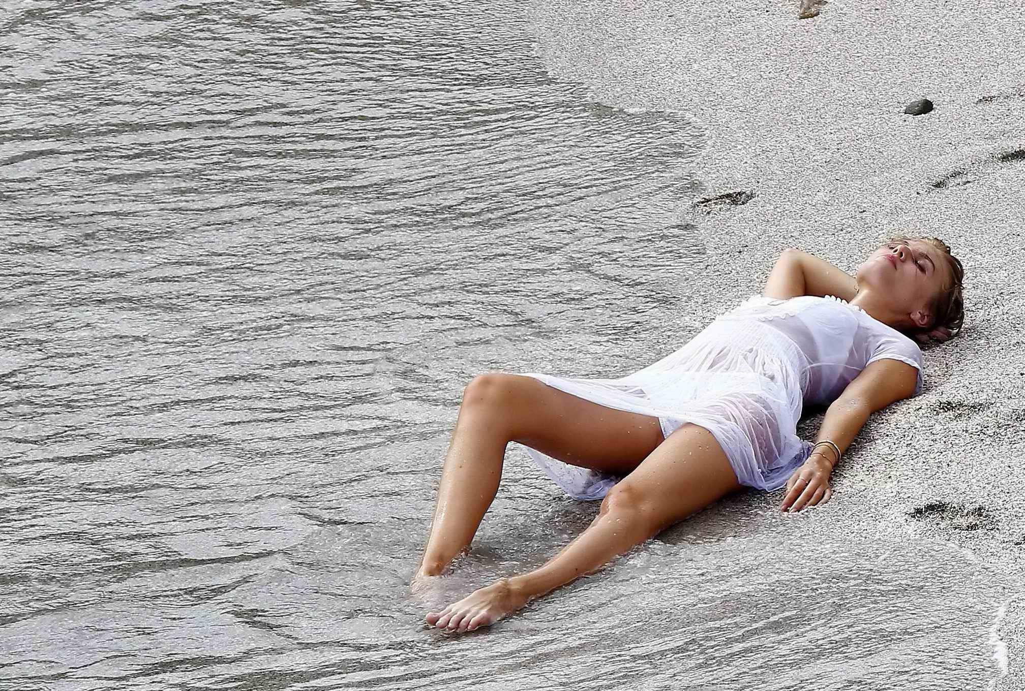 16P Maryna Linchuk getting her boobs groped while changing on the set of a Vogue pho
