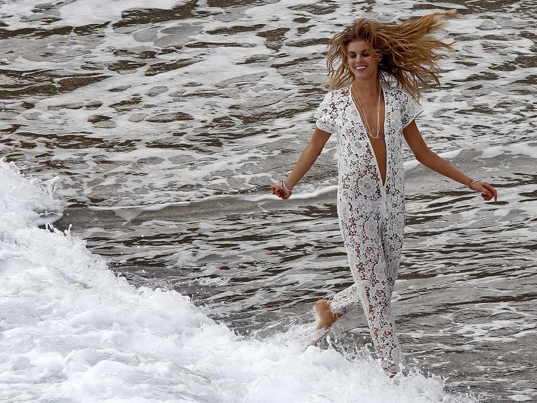 16P Maryna Linchuk getting her boobs groped while changing on the set of a Vogue pho