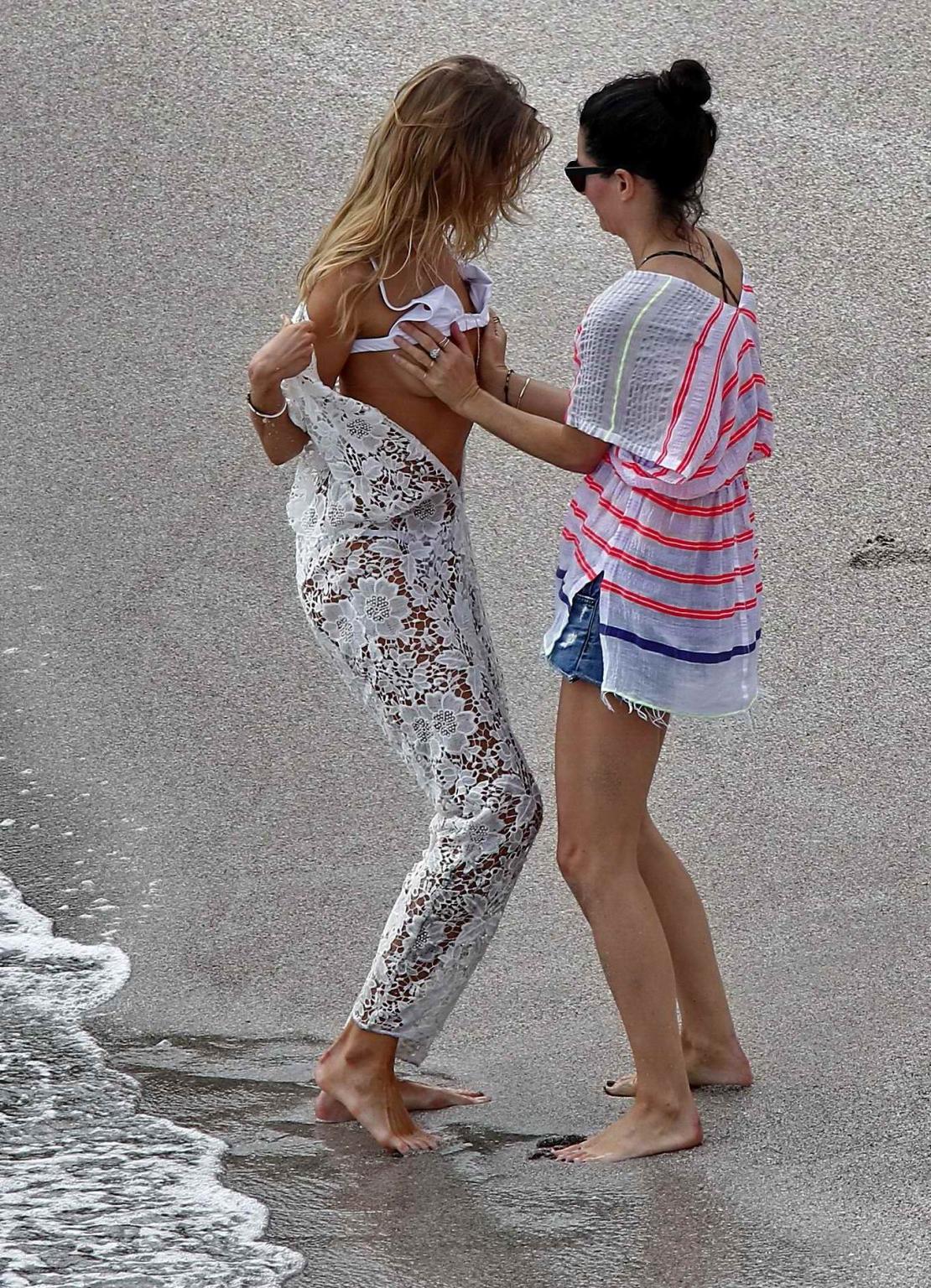 16P Maryna Linchuk getting her boobs groped while changing on the set of a Vogue pho