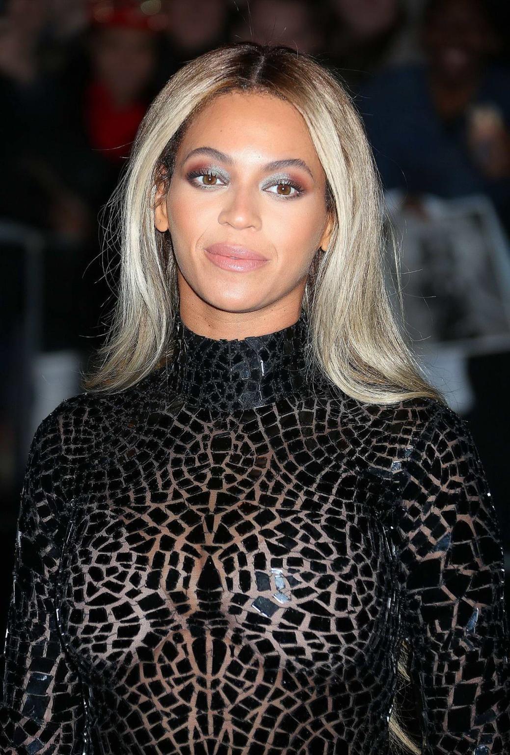 16P Beyonce Knowles see-through to bra during her album release party at SVA Theater
