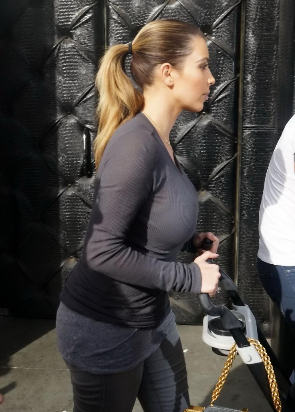 16P Kim Kardashian see through to bra while out shopping