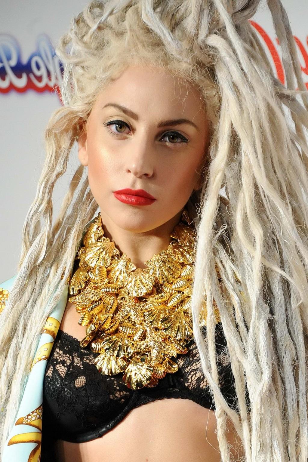 16P Lady Gaga shows off her black bra attending Capital FM Jingle Bell Ball on Day2 