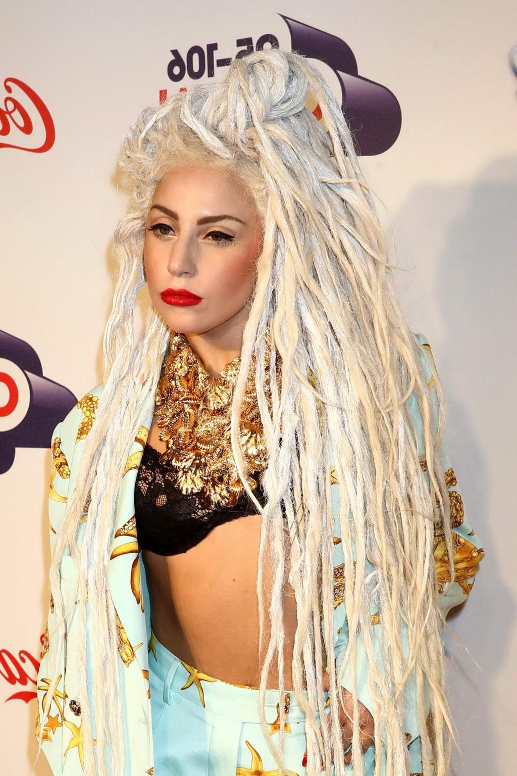 16P Lady Gaga shows off her black bra attending Capital FM Jingle Bell Ball on Day2 