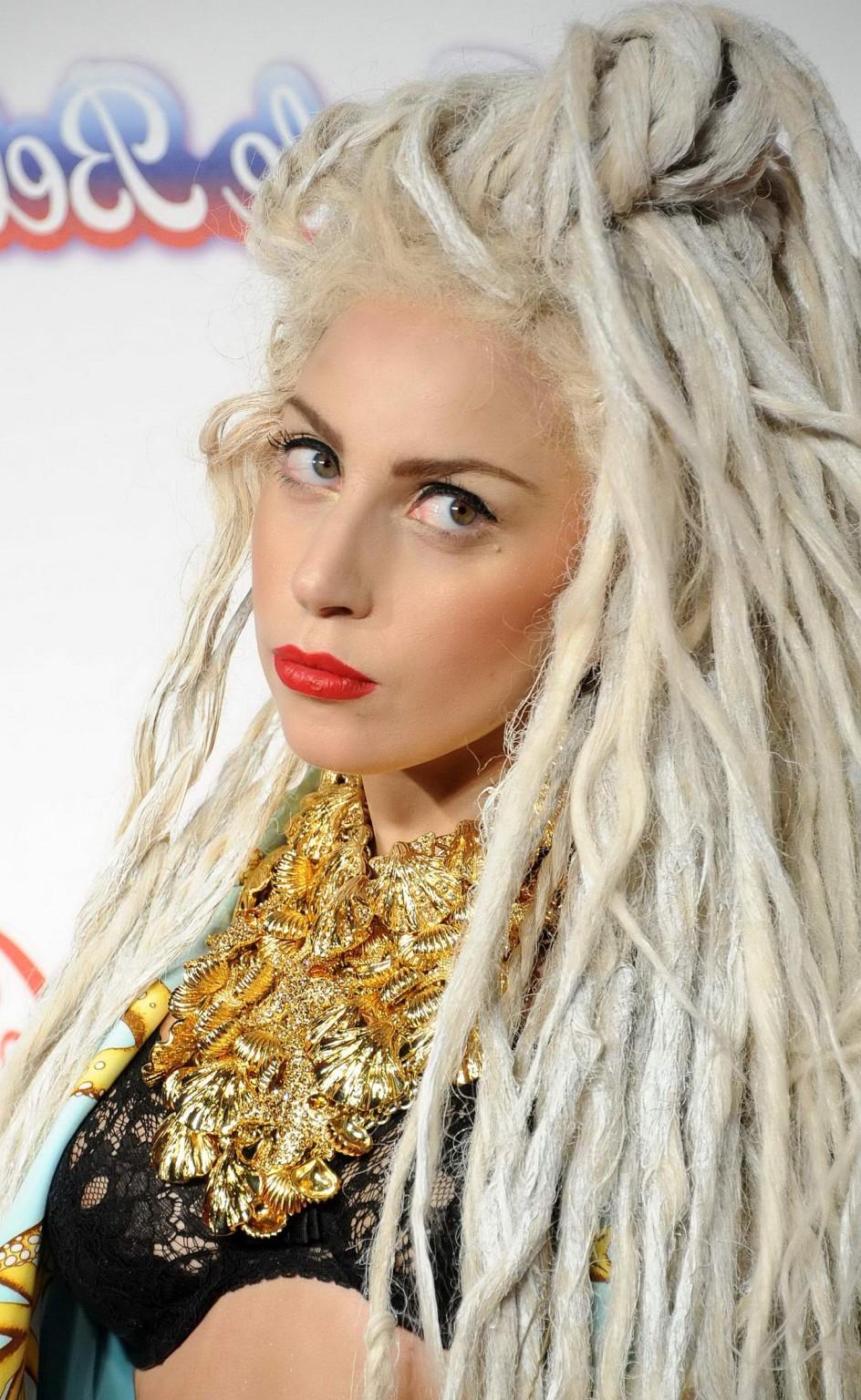 16P Lady Gaga shows off her black bra attending Capital FM Jingle Bell Ball on Day2 