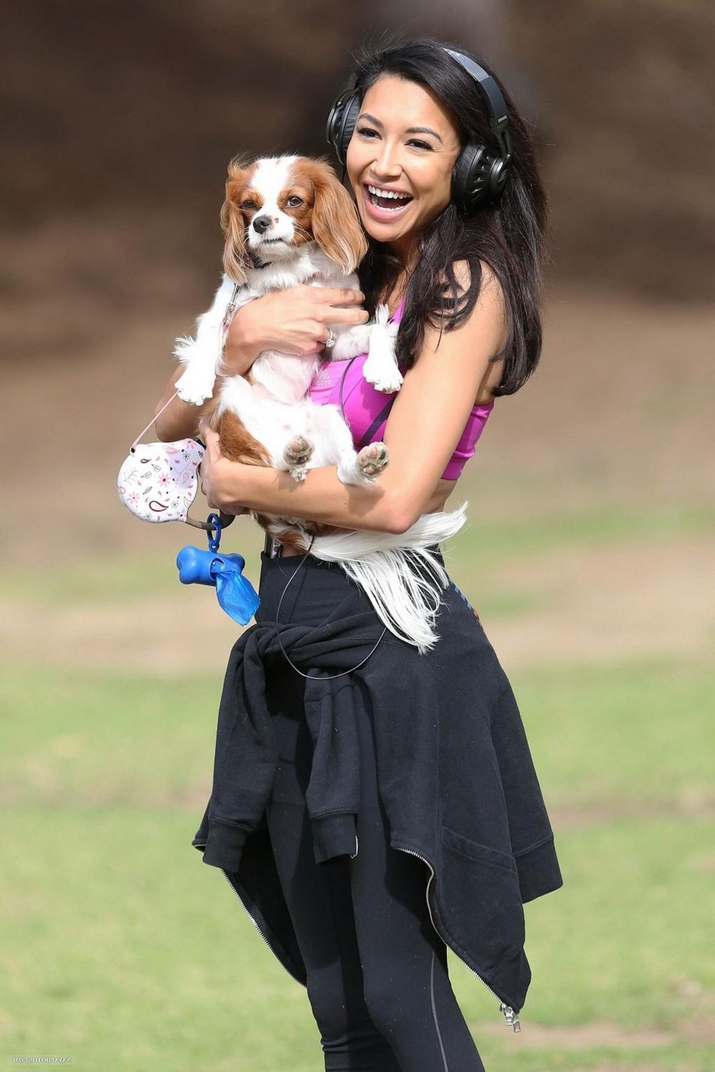 16P Naya Rivera wearing sports bra and tights while walking her dog at Griffith Park