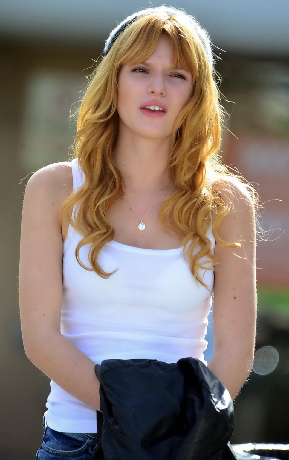 16P Bella Thorne wearing see-through to bra top and jeans out in Studio City