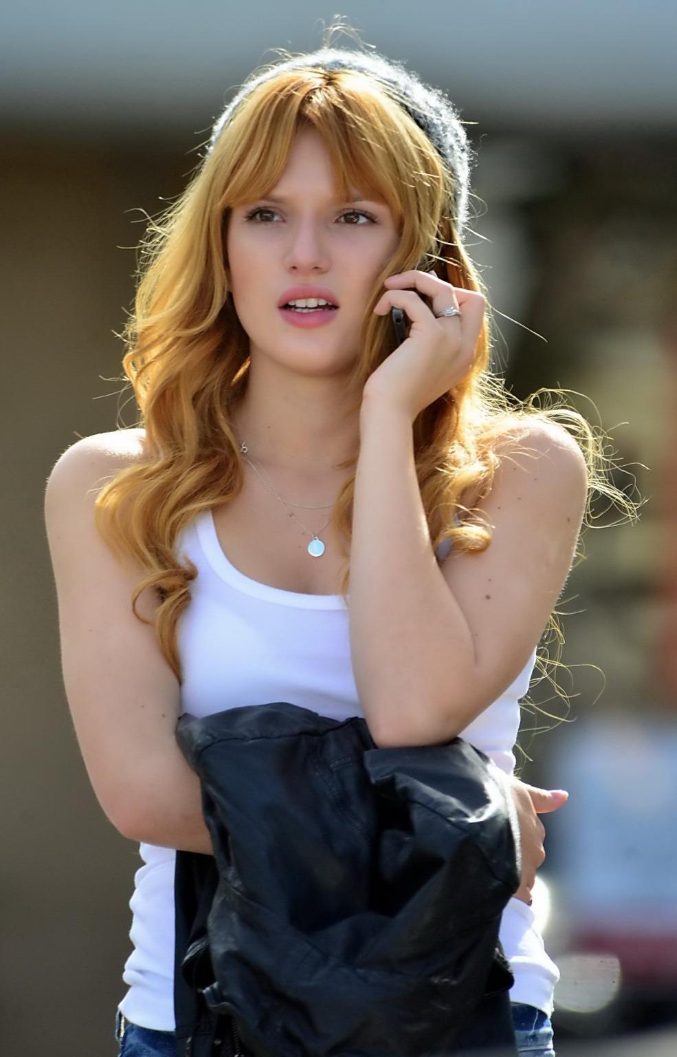 16P Bella Thorne wearing see-through to bra top and jeans out in Studio City