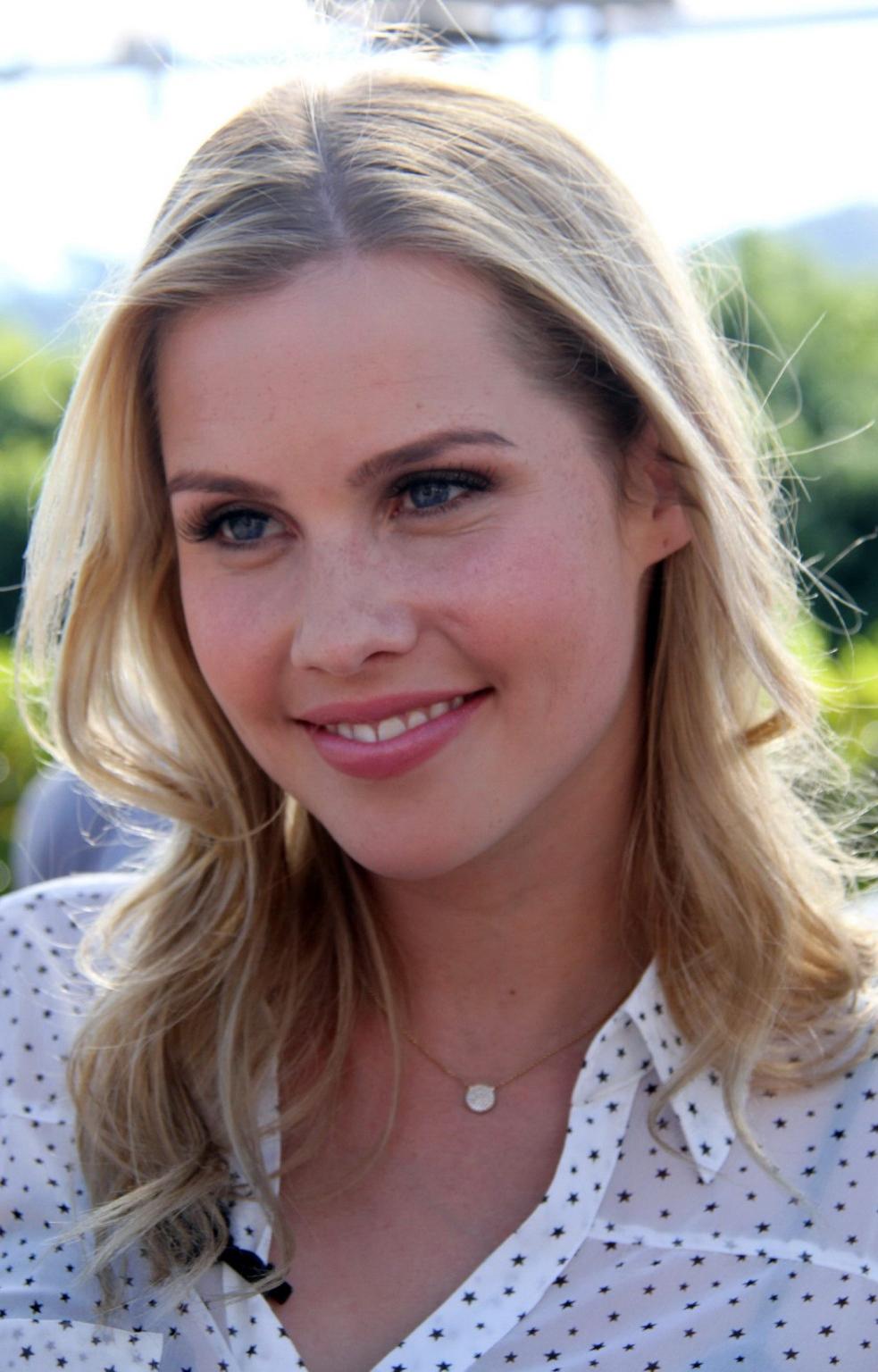 16P Claire Holt leggy  see through to bra on the set of Extra in Universal City