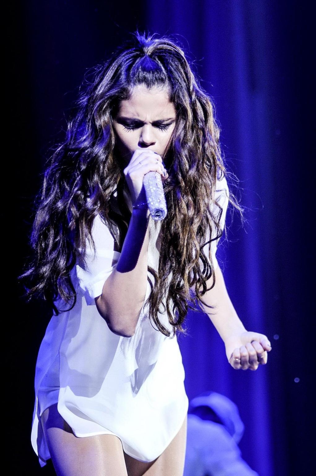 16P Selena Gomez leggy  see through to bra at the 'Star Dance' tour in Washington