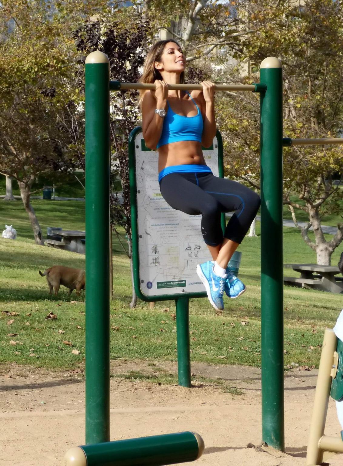 16P Leilani Dowding in sports bra  tights working out at the Pan Pacific Park in Wes