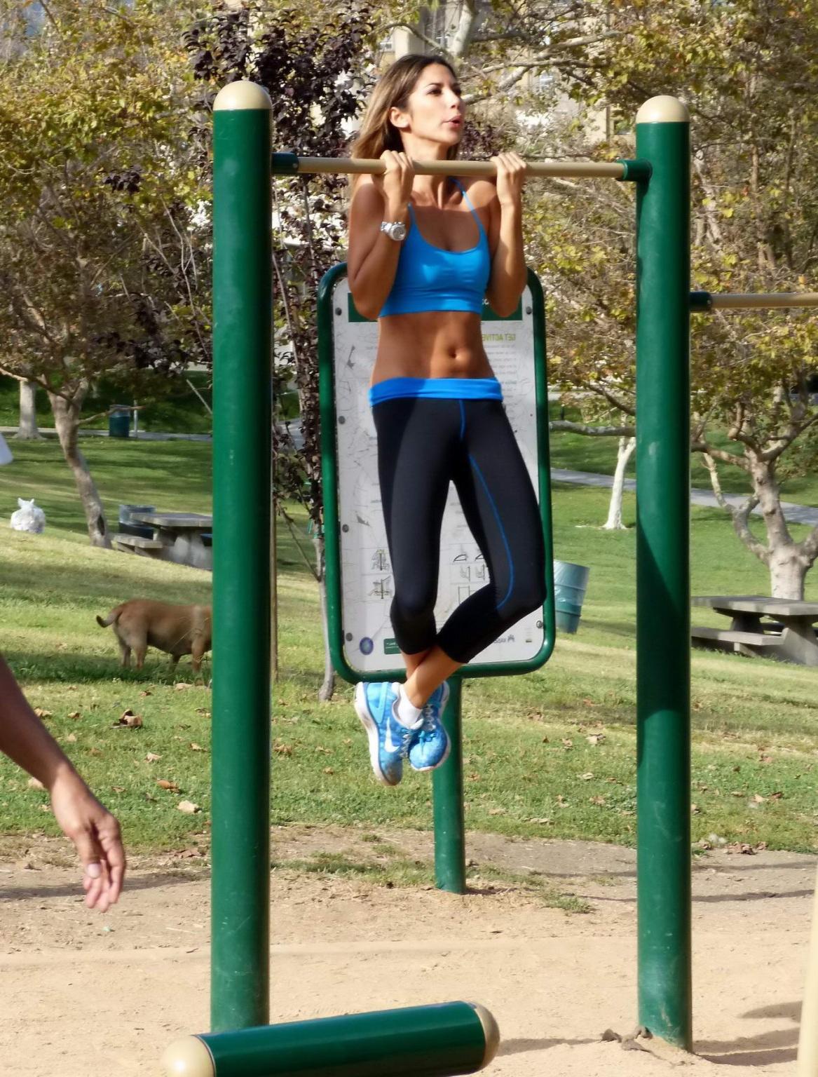 16P Leilani Dowding in sports bra  tights working out at the Pan Pacific Park in Wes