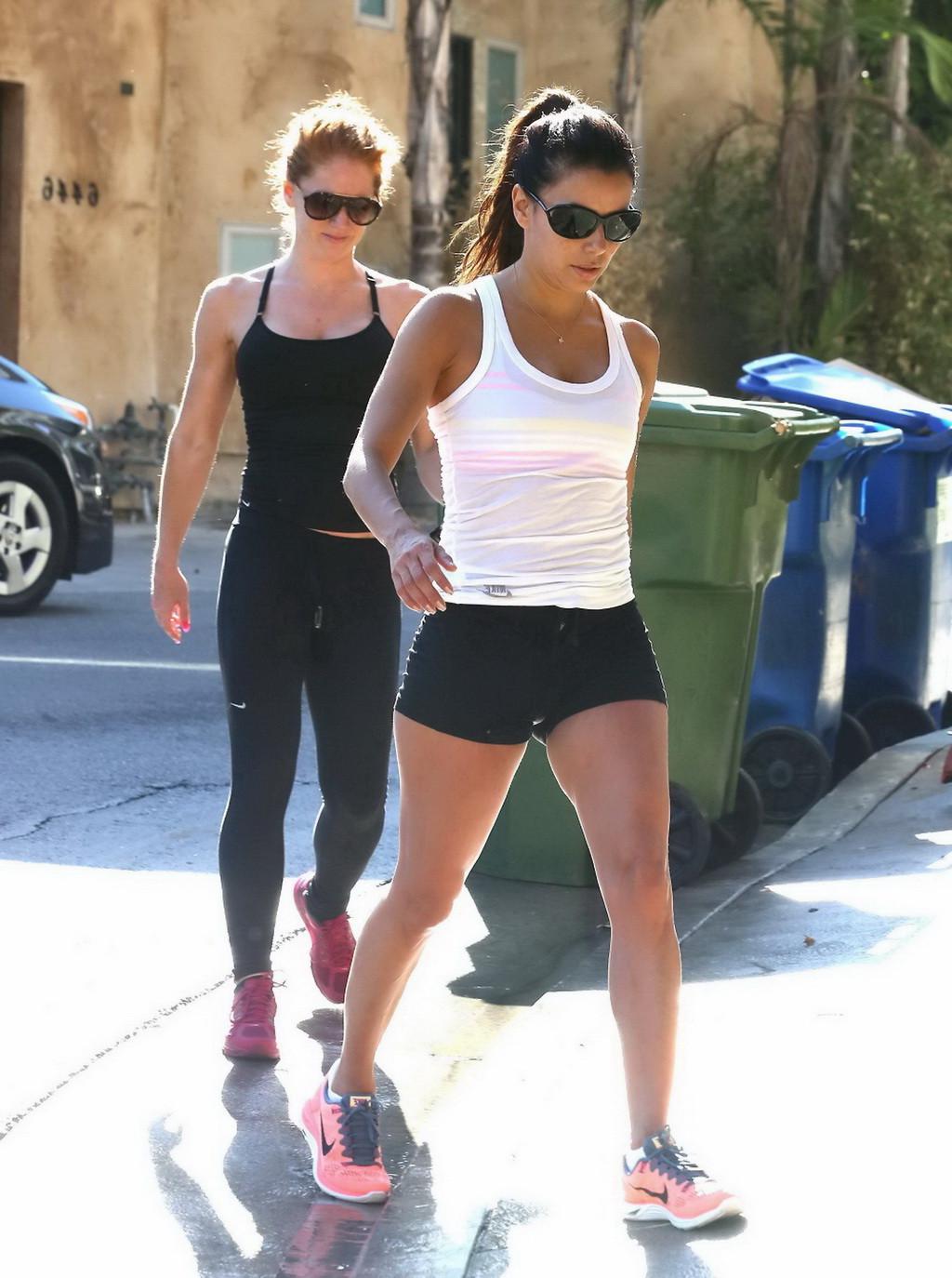 16P Eva Longoria wearing see-through to bra top and tight shorts while heading to th