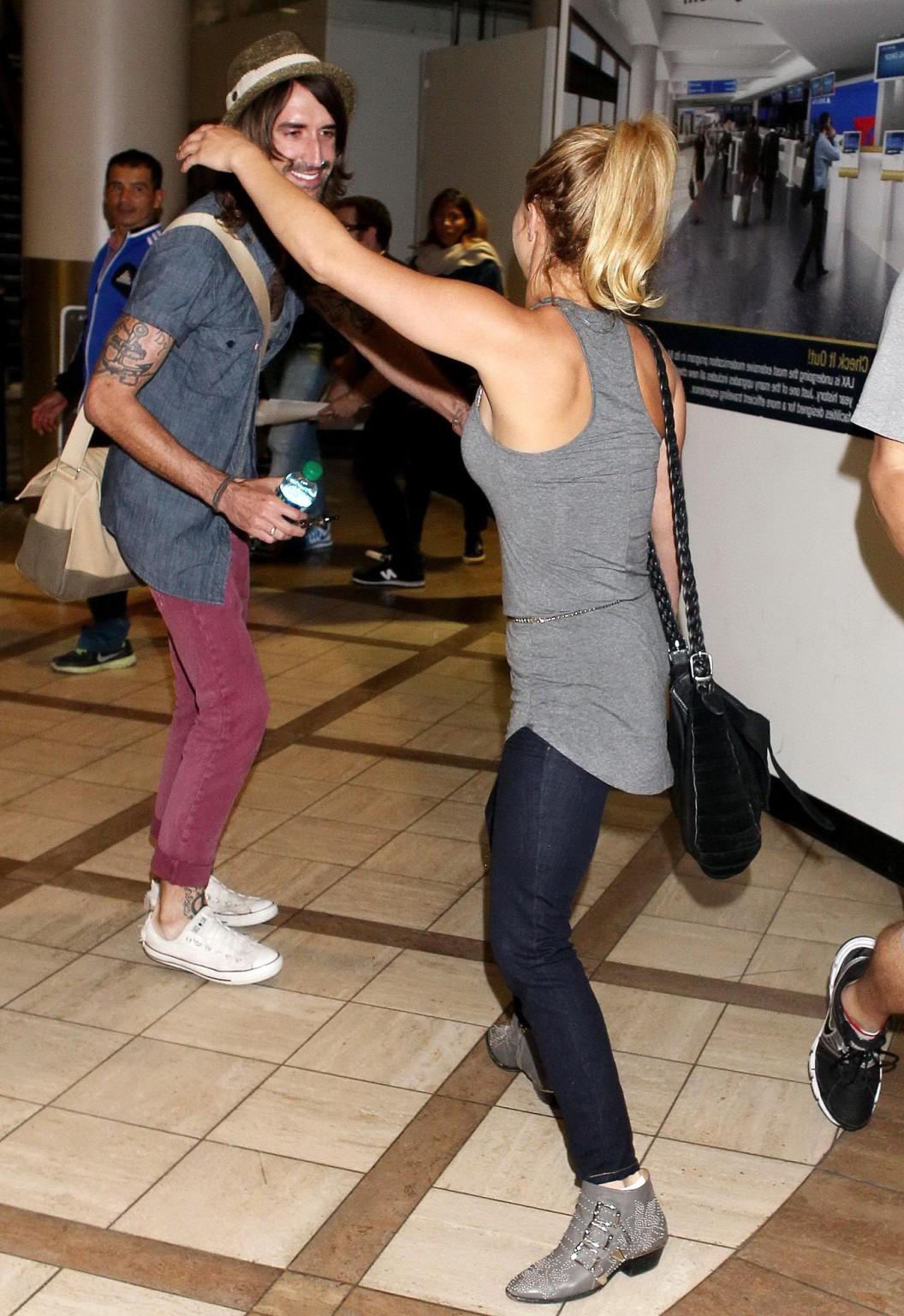 16P Hayden Panettiere see through to bra wearing a tight top at LAX Airport