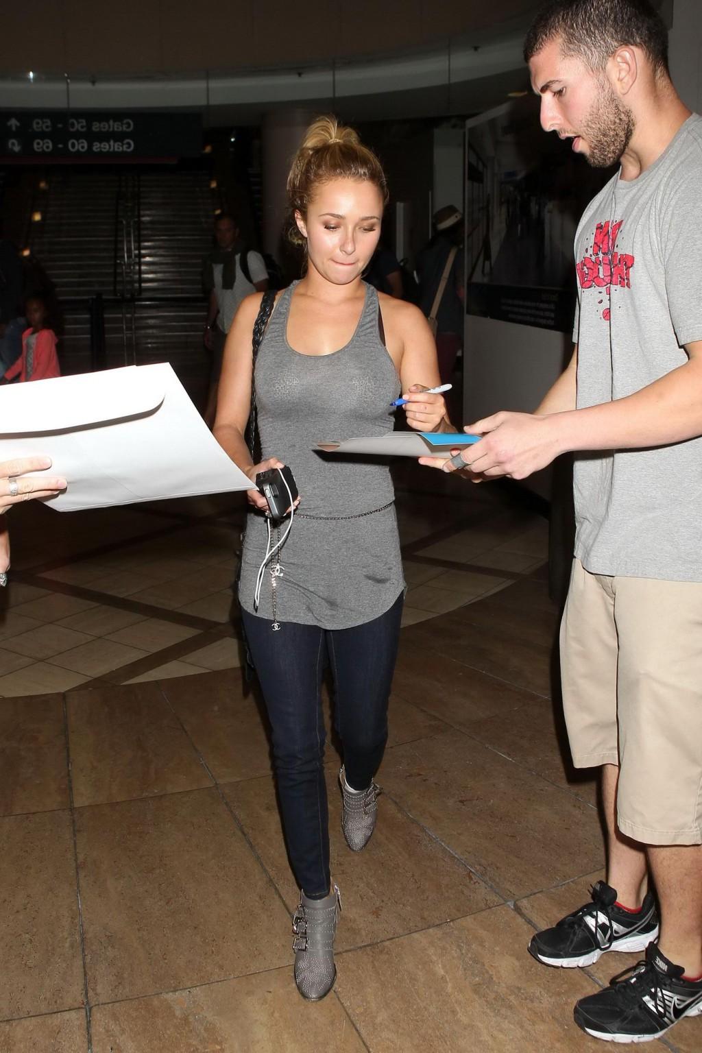 16P Hayden Panettiere see through to bra wearing a tight top at LAX Airport