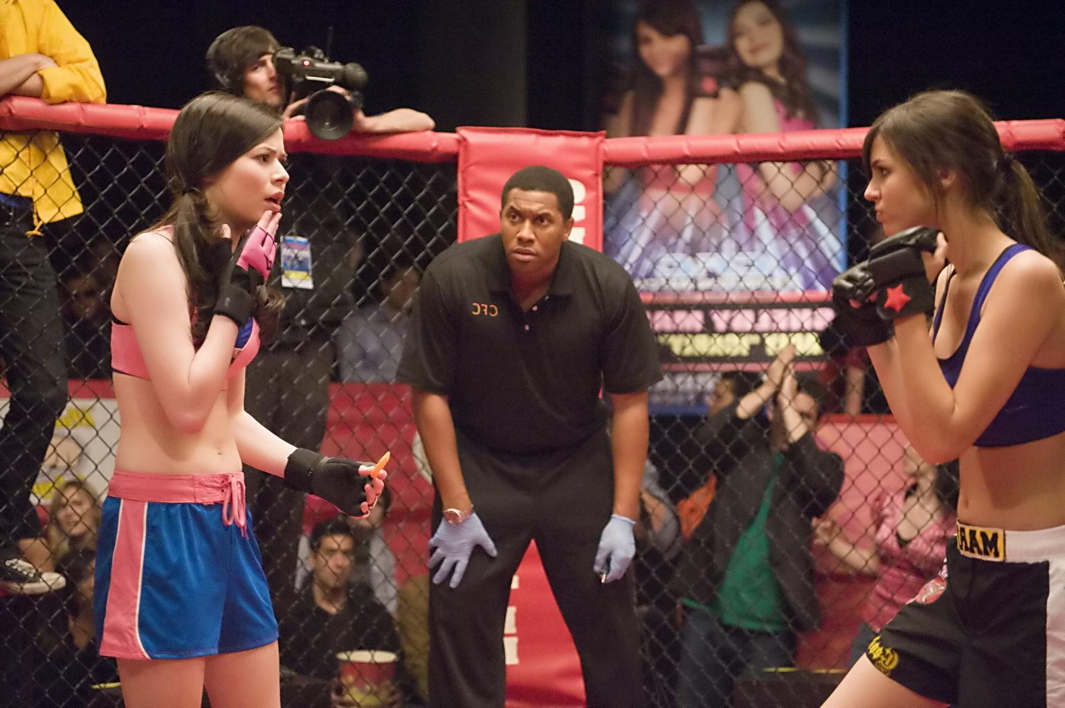 16P Miranda Cosgrove wearing sports bra and shorts boxing with Victoria Justice on t