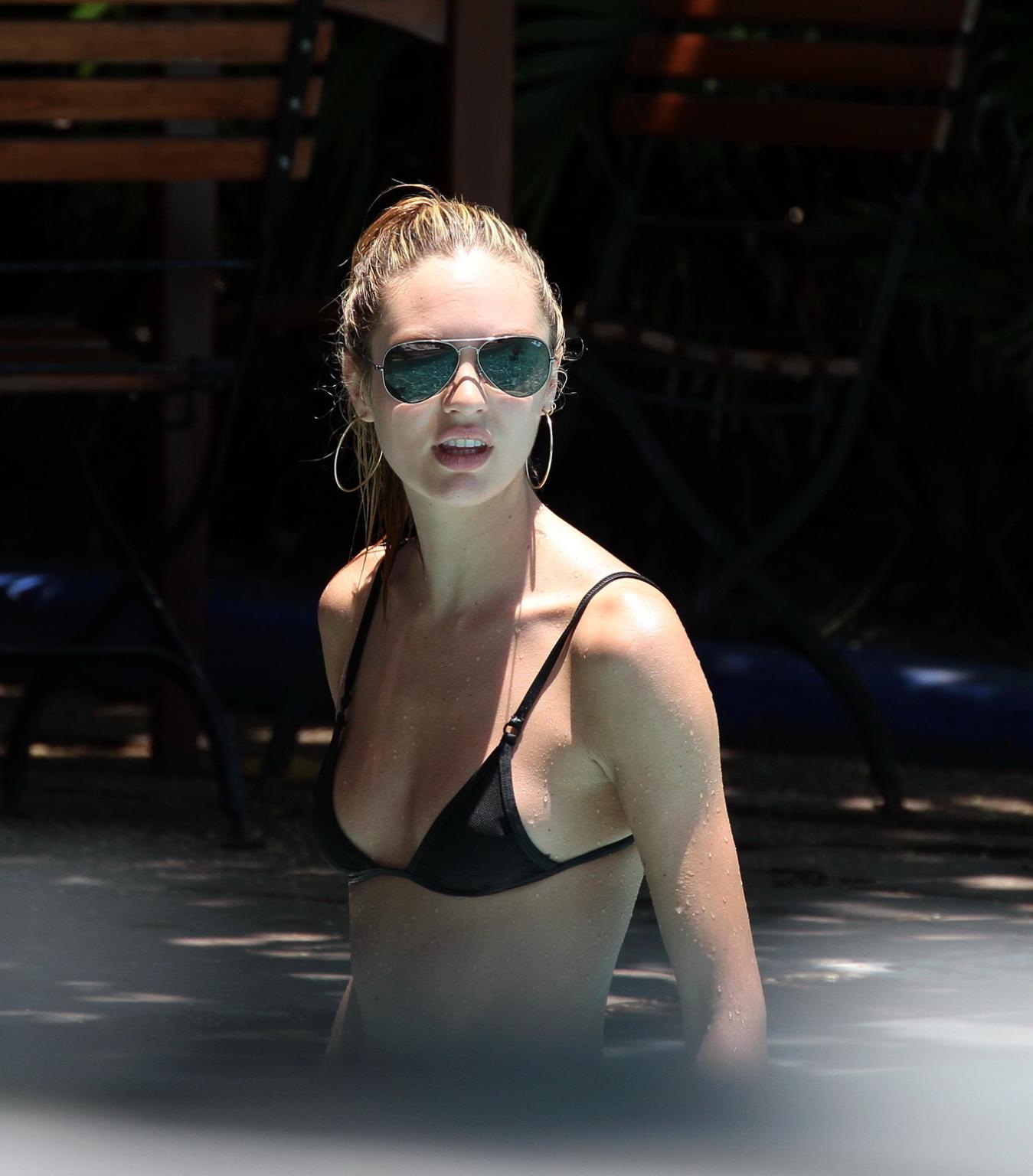 6P Candice Swanepoel in sexy black bikini petting with her boyfriend at the pool in