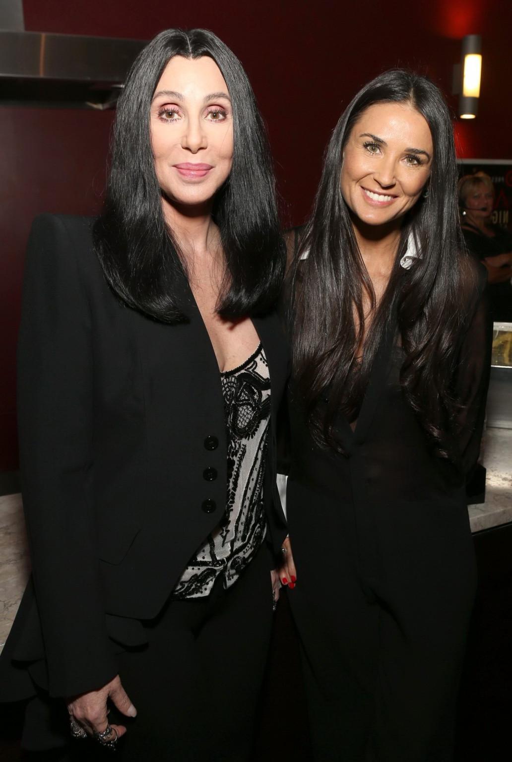 16P Demi Moore shows off her big boobs wearing a see through bra  shirt at the ArcLi