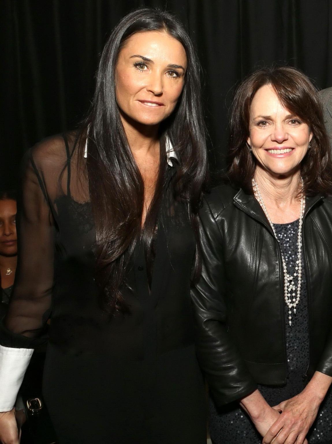 16P Demi Moore shows off her big boobs wearing a see through bra  shirt at the ArcLi