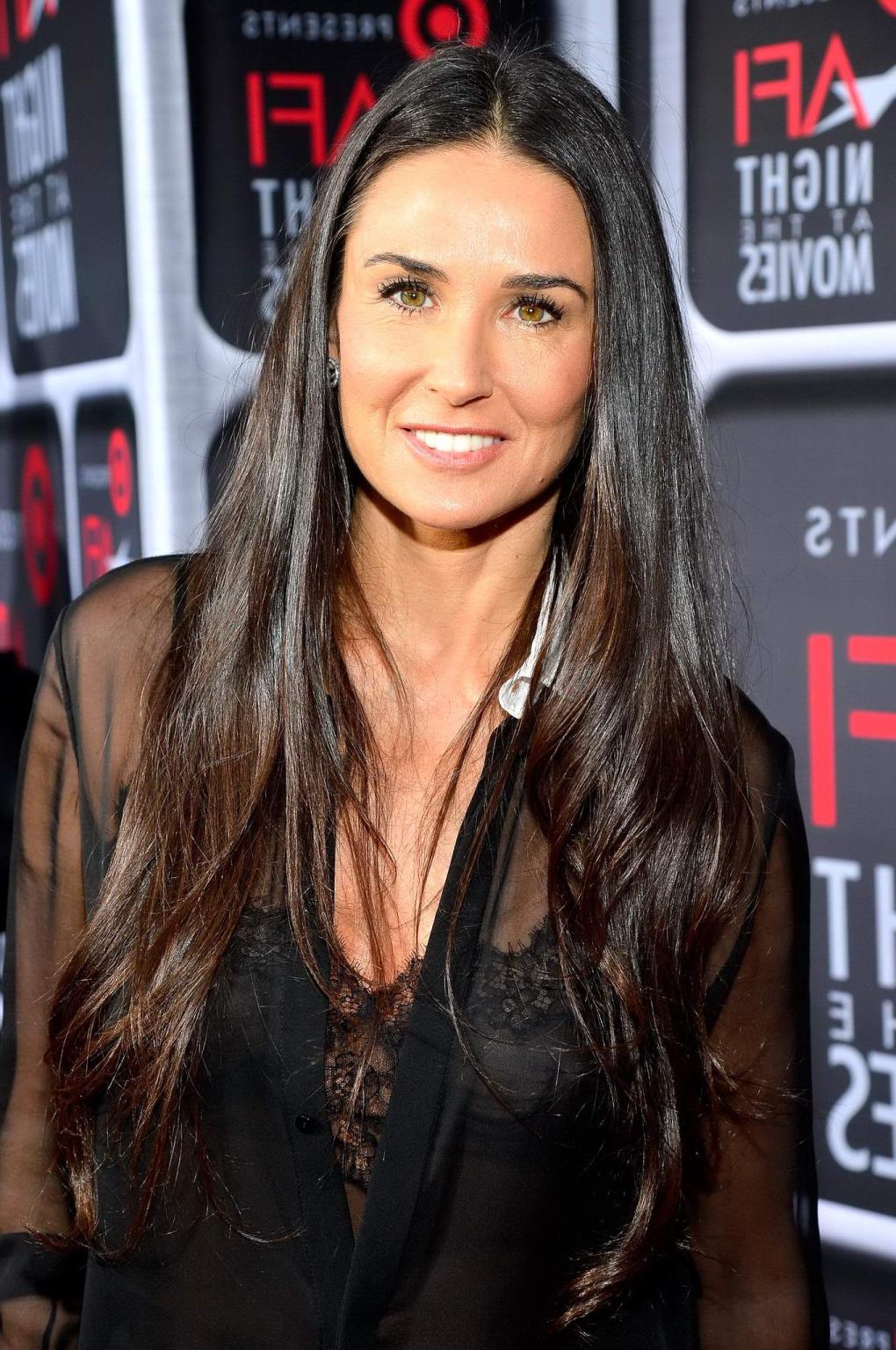 16P Demi Moore shows off her big boobs wearing a see through bra  shirt at the ArcLi