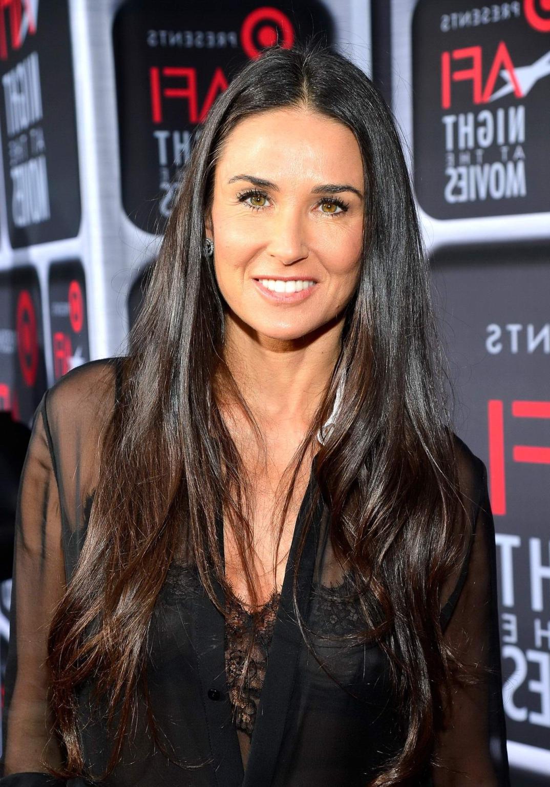 16P Demi Moore shows off her big boobs wearing a see through bra  shirt at the ArcLi