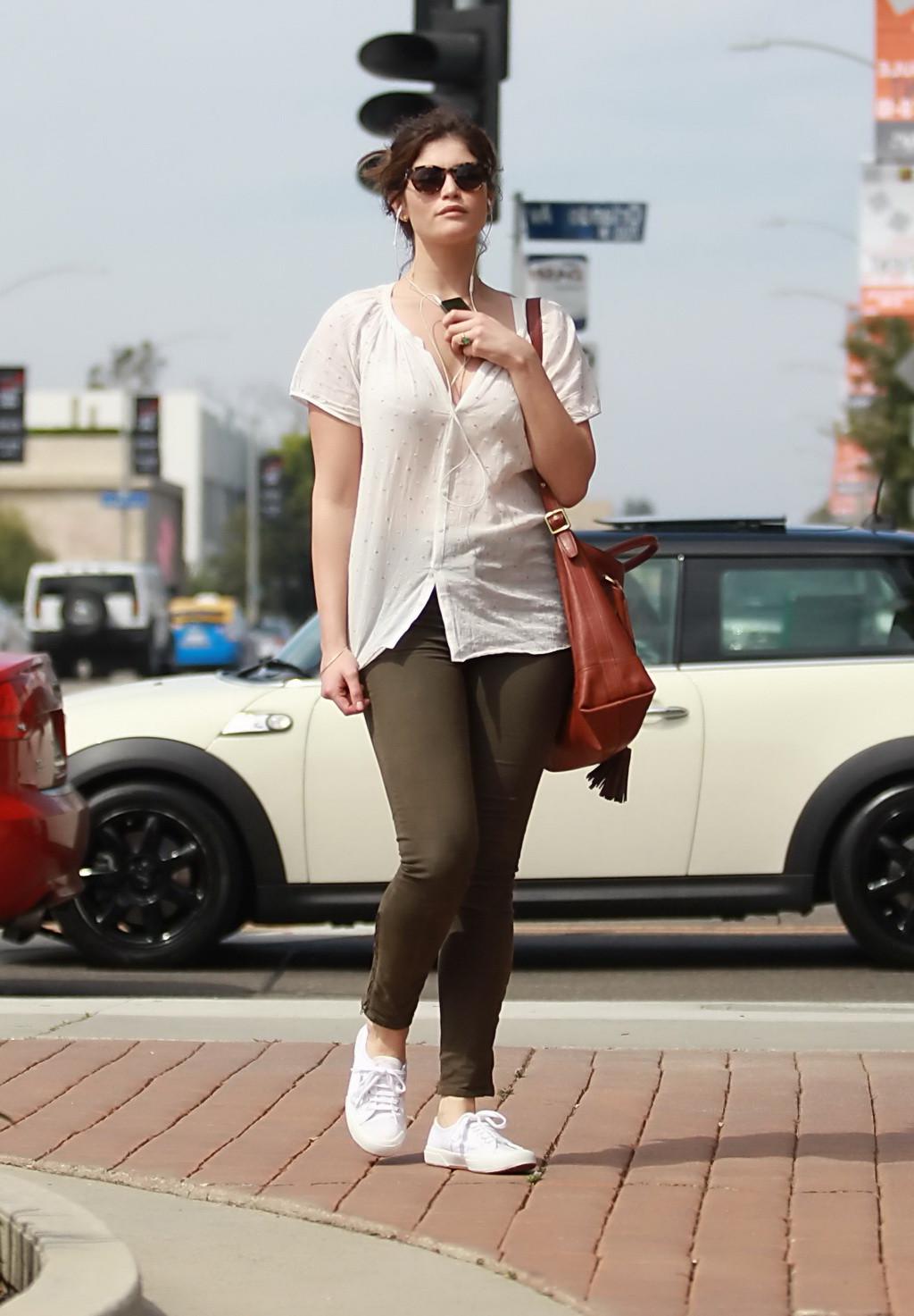 16P Gemma Arterton cleavy wearing see-thru to bra top and skintight pants out in Hol