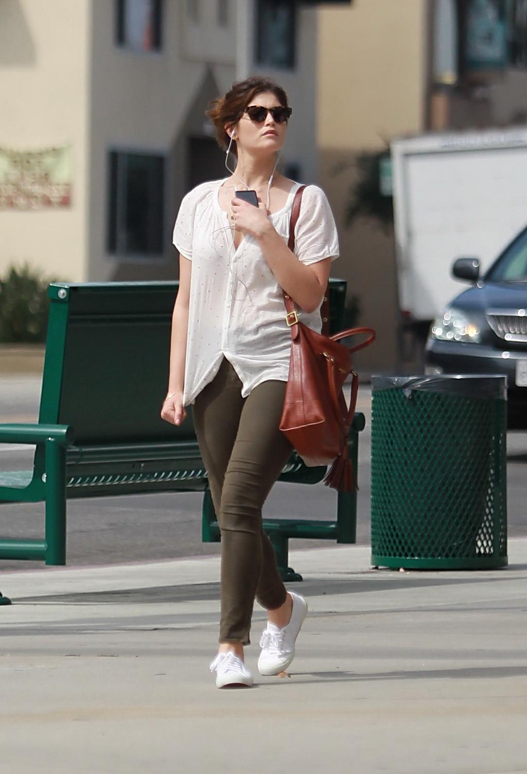 16P Gemma Arterton cleavy wearing see-thru to bra top and skintight pants out in Hol