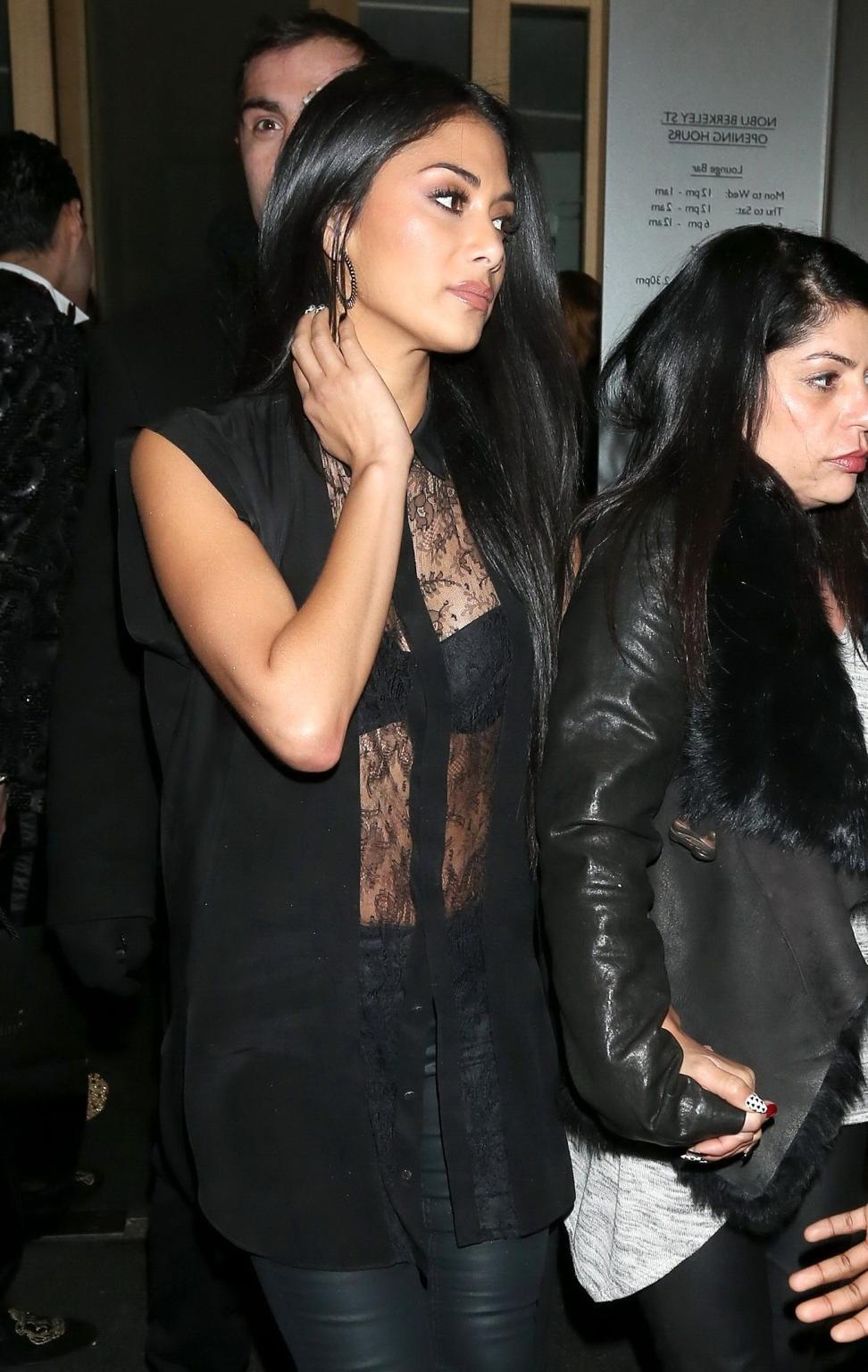 16P Nicole Scherzinger see through to bra outside Nobu Berkeley restaurant in London