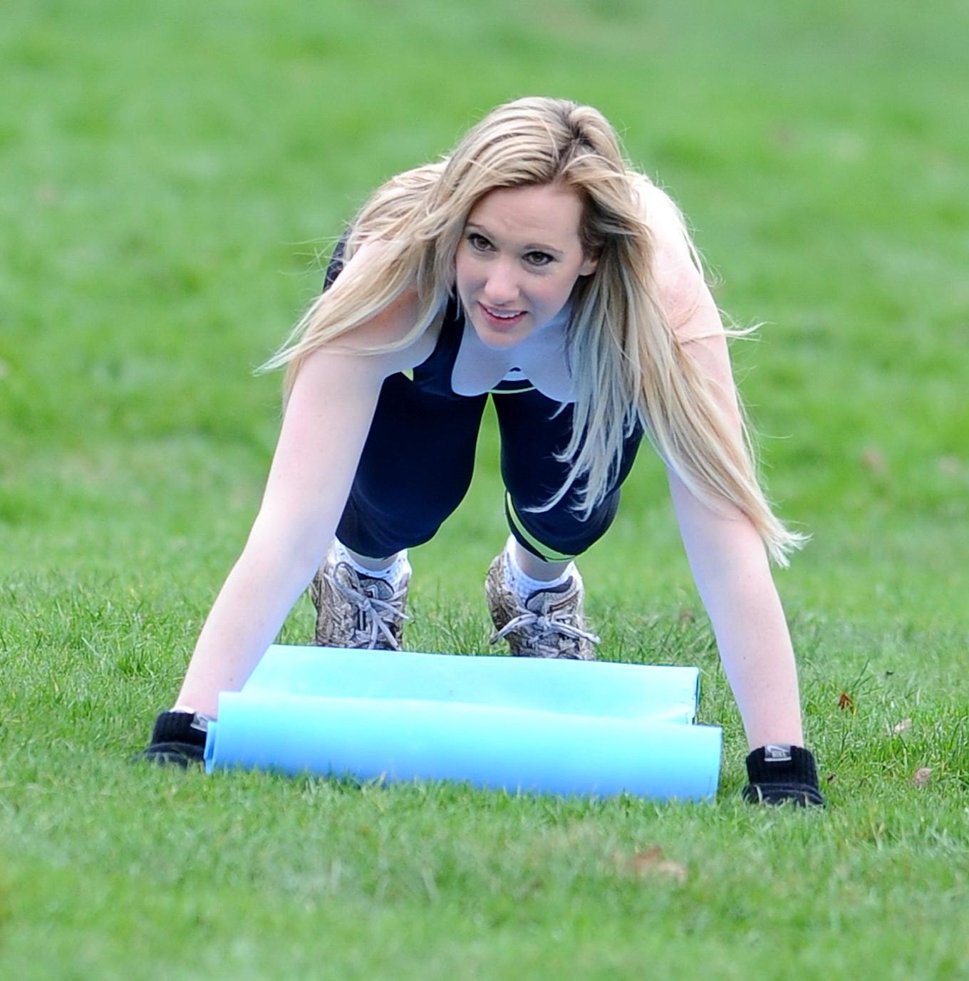 10P Rebecca Ferdinando in sports bra  tights working out in a North London